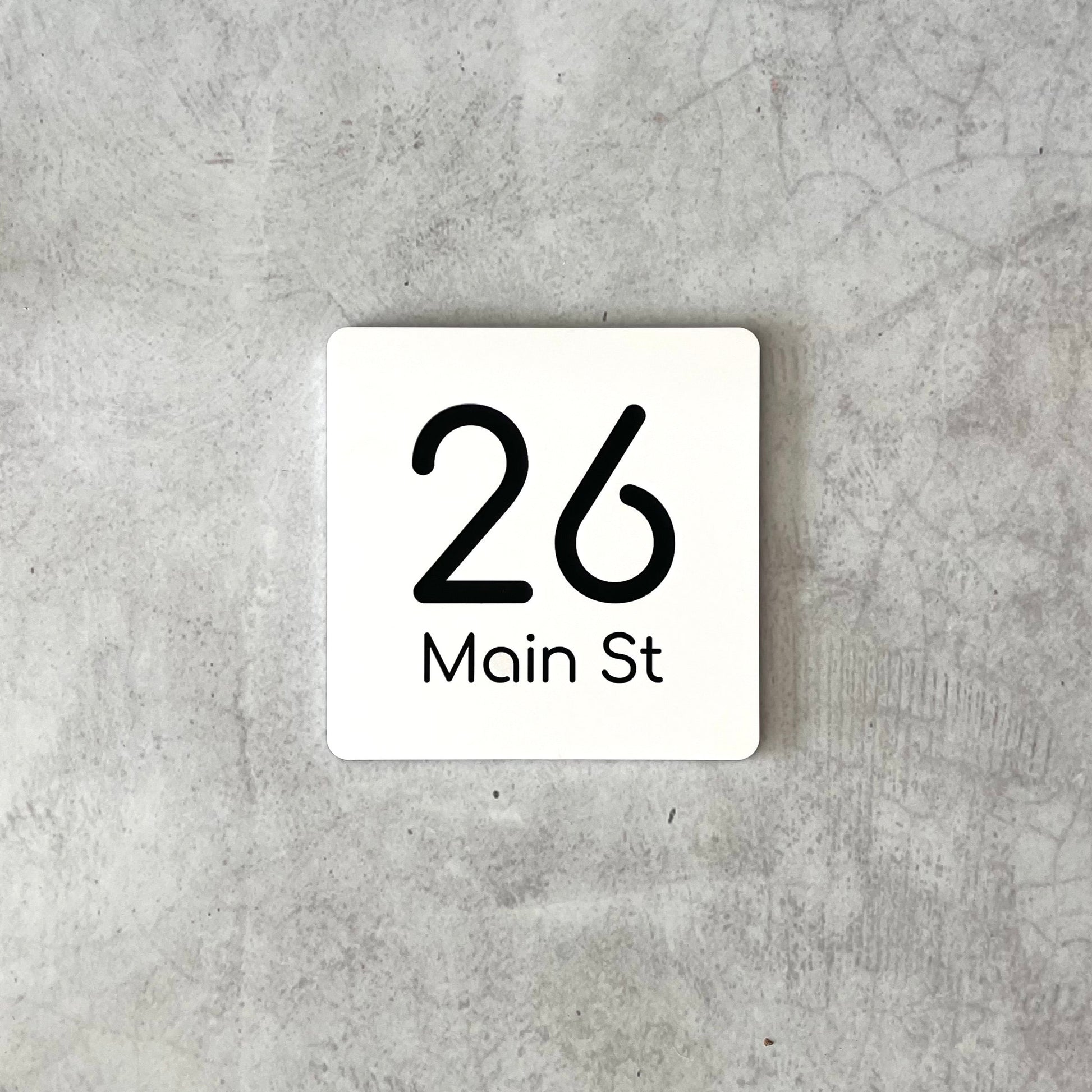 Modern square white house number sign with sleek hidden mounting tape