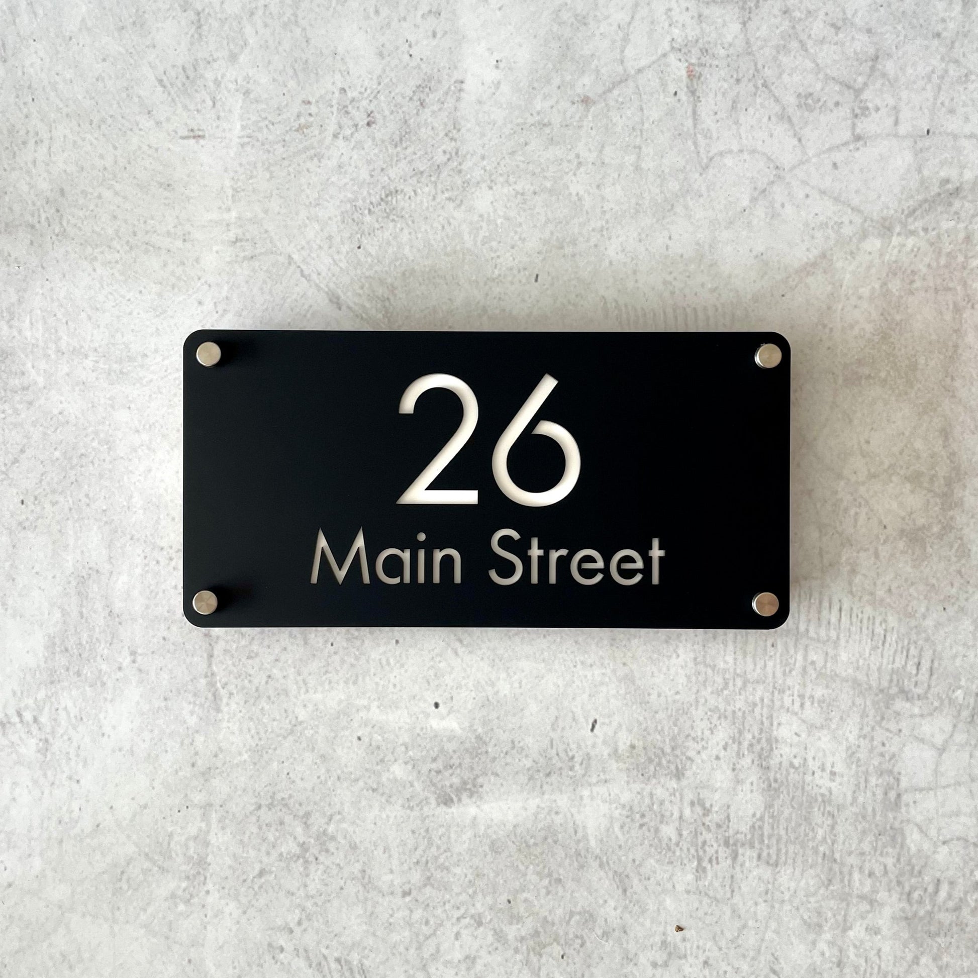 Sleek and modern house number sign with stainless steel standoff mounts