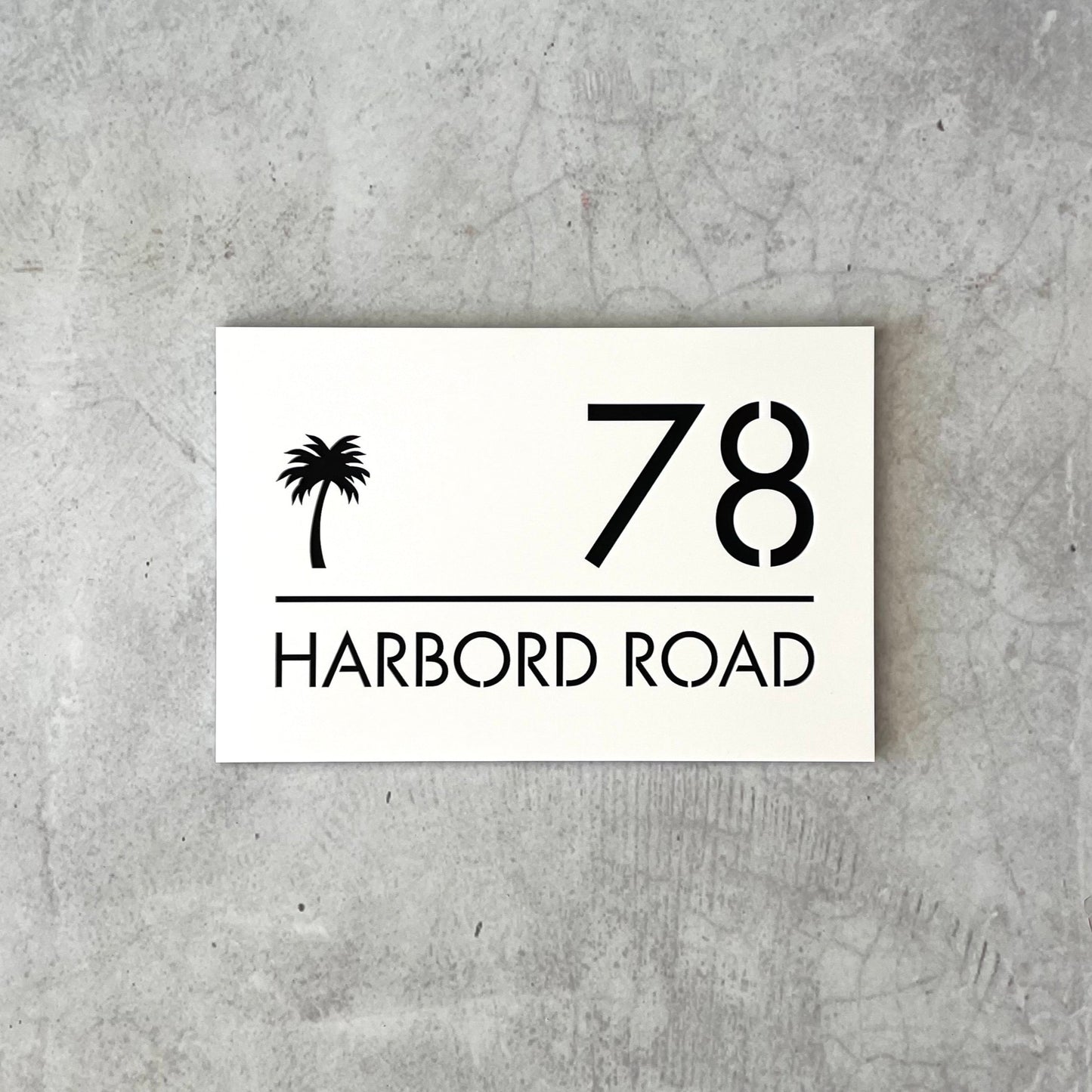 modern number plaque with palm tree detail