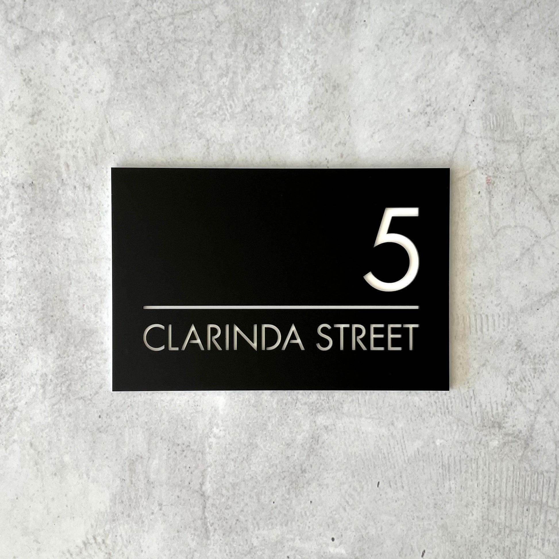 modern stick on house number with street name in black and white