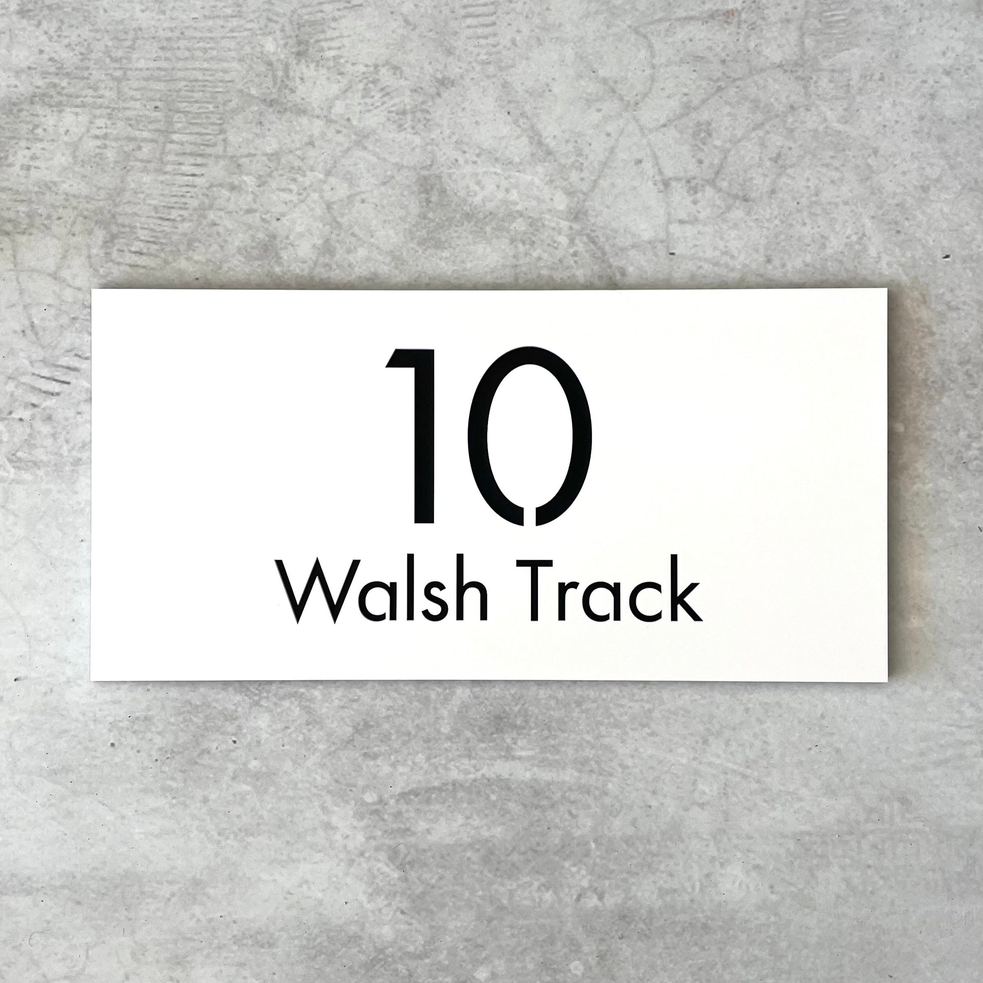 contemporary white house number plaque