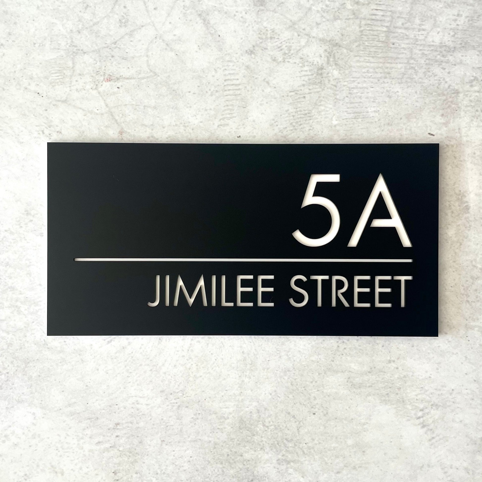 Contemporary house number sign in black acrylic