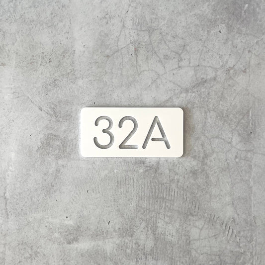 Minimalist white house numbers with peel and stick installation