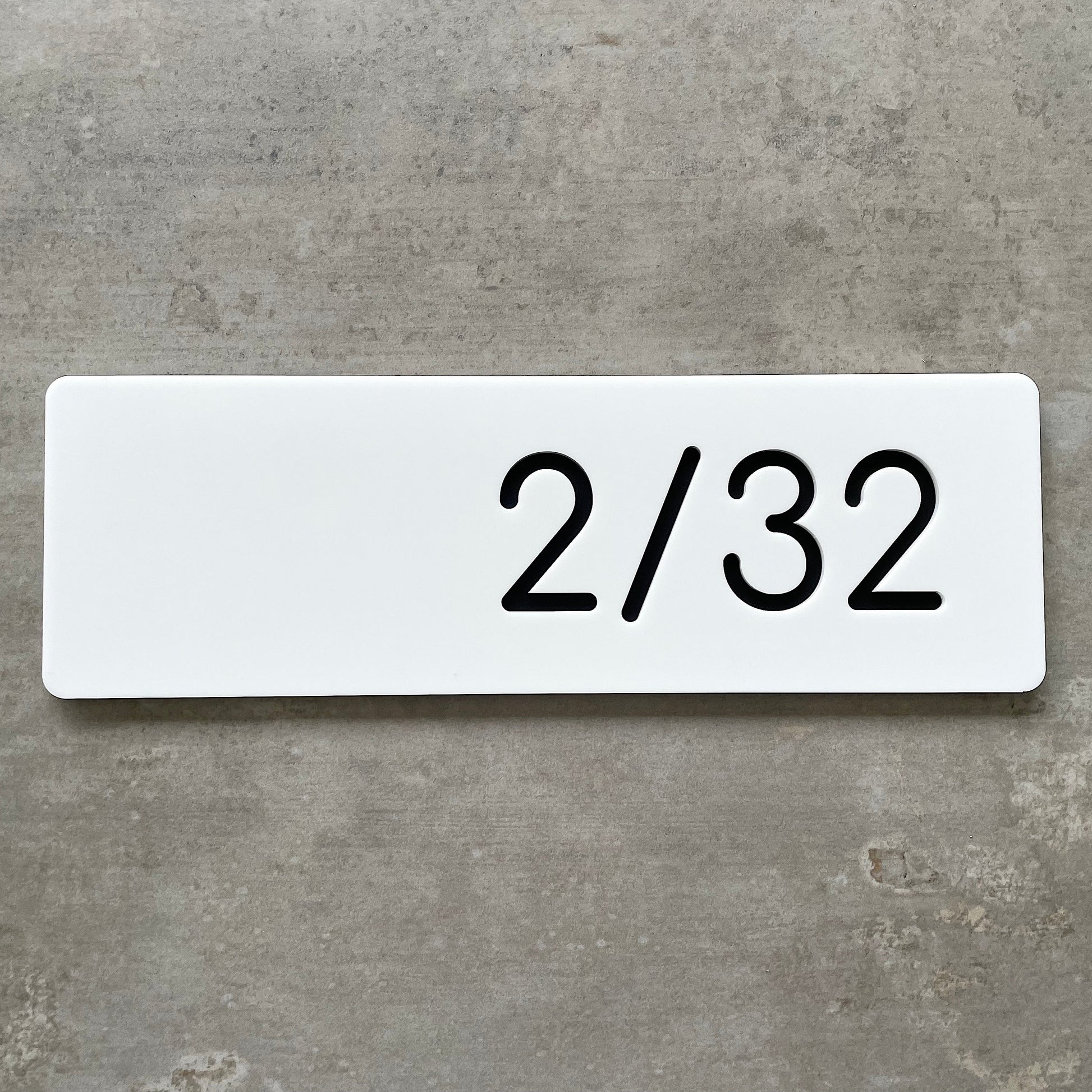 white acrylic house numbers ideal for units and apartments