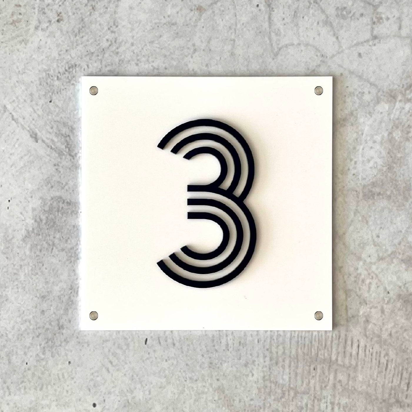 Custom 3D house sign in white and black, designed to withstand extreme weather conditions