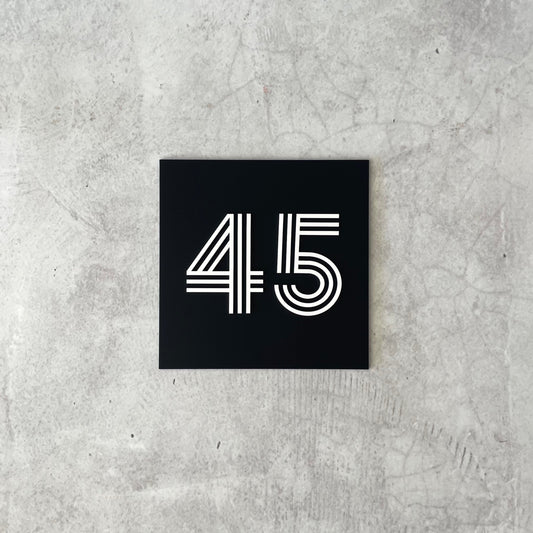 Three-dimensional house number sign with floating text, premium outdoor signage