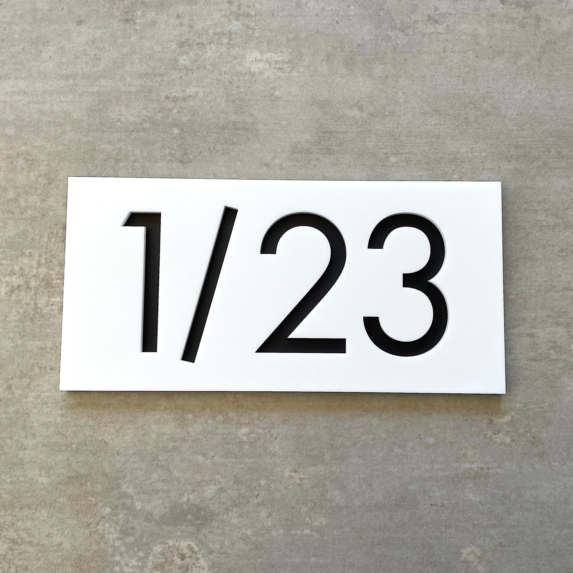 white acrylic house numbers ideal for units or apartments