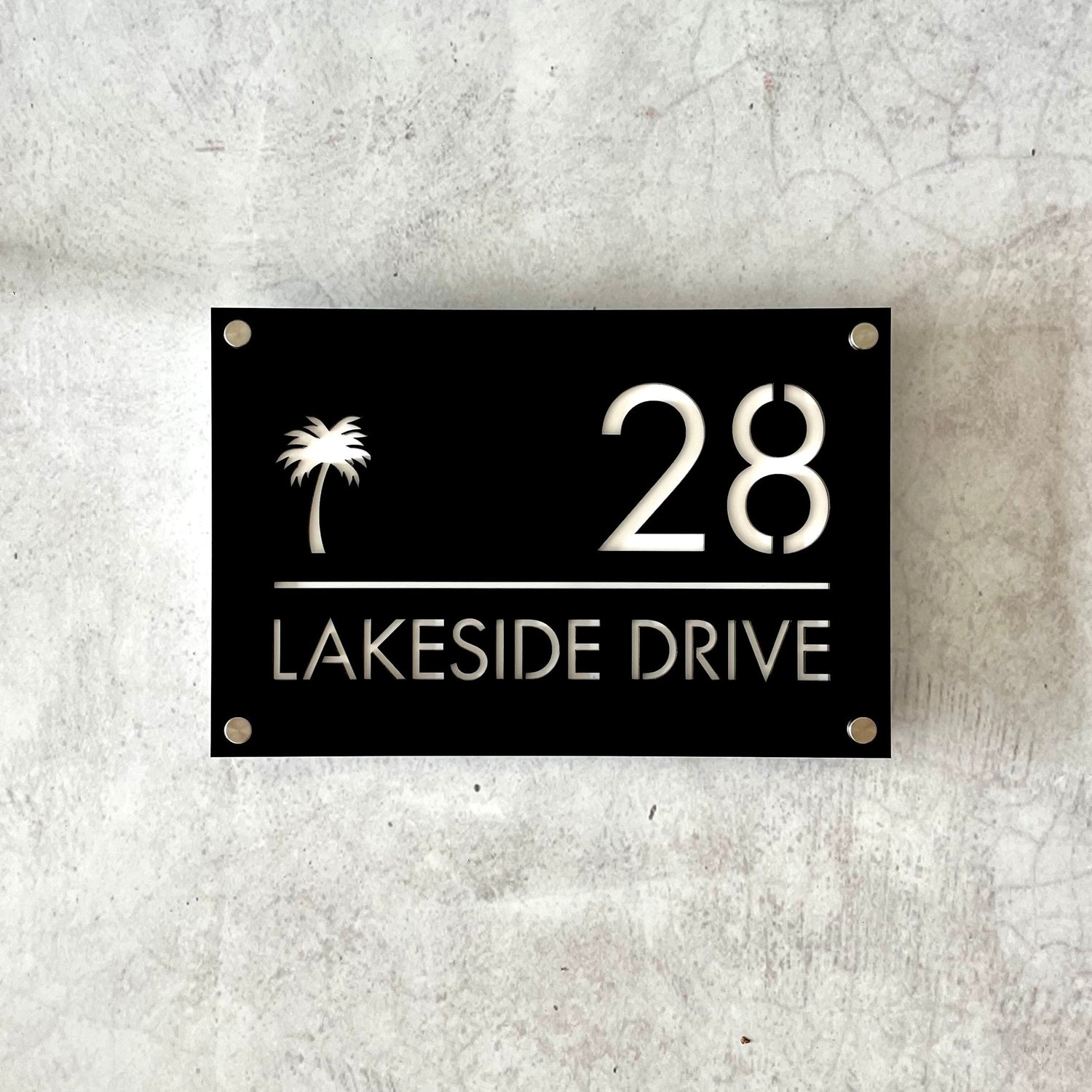 Modern acrylic house sign with contrasting layers for depth and style, suitable for exterior walls